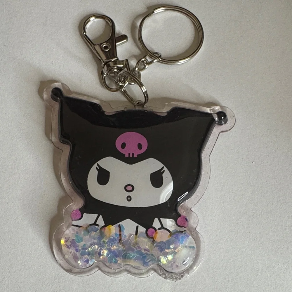 Cute Character Keychain with Black and Pink Accents